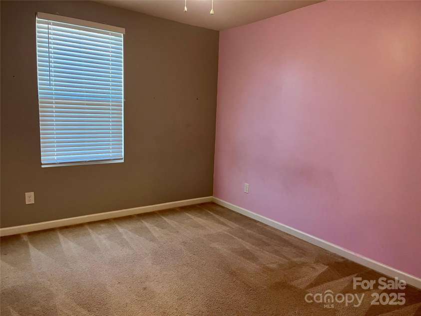 1148 Tangle Ridge Drive, Concord, NC 28025.  MLS# CAR4216659, YatesRealty ID 2221. Bedroom