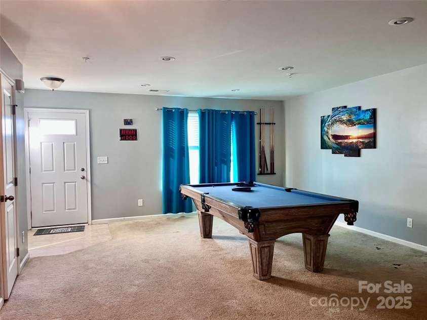 1148 Tangle Ridge Drive, Concord, NC 28025.  MLS# CAR4216659, YatesRealty ID 2221. Large living room