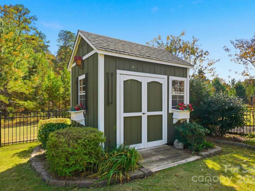 4069 Henshaw Road, Waxhaw, NC 28173.  MLS# CAR4323046, YatesRealty ID 2221. Custom storage shed.