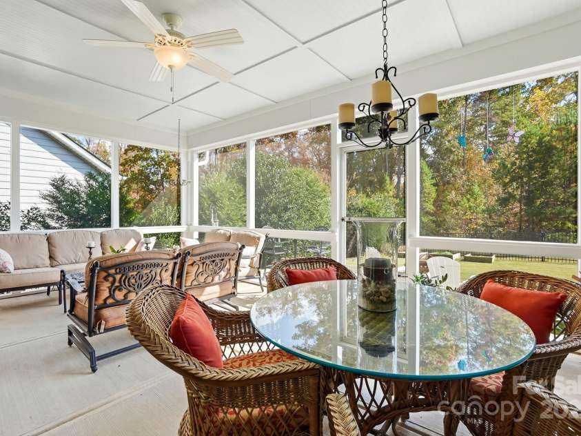4069 Henshaw Road, Waxhaw, NC 28173.  MLS# CAR4323046, YatesRealty ID 2221. Gorgeous inviting screen porch.