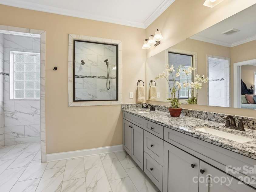 4069 Henshaw Road, Waxhaw, NC 28173.  MLS# CAR4323046, YatesRealty ID 2221. Large dual bowl vanity.