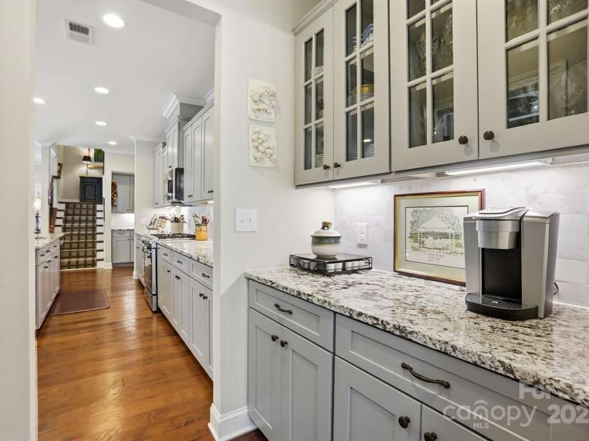 4069 Henshaw Road, Waxhaw, NC 28173.  MLS# CAR4323046, YatesRealty ID 2221. One of two butler pantries. Great coffee bar!