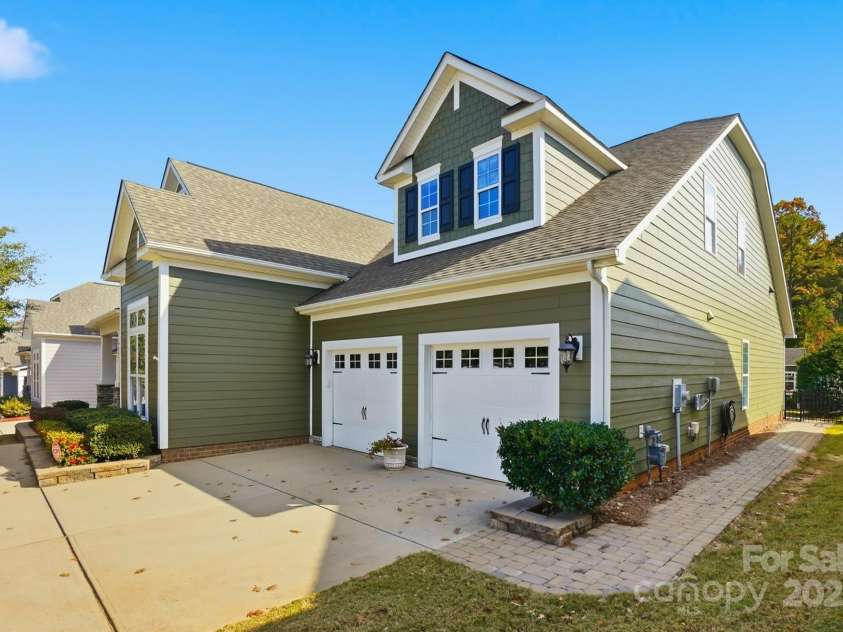 4069 Henshaw Road, Waxhaw, NC 28173.  MLS# CAR4323046, YatesRealty ID 2221. Paver walkway leads to rear paver patio.