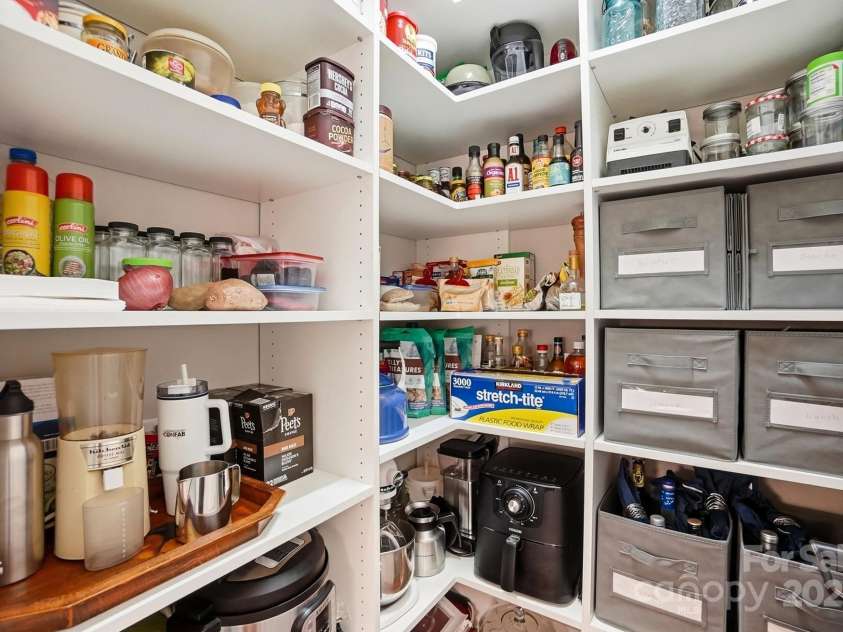 4069 Henshaw Road, Waxhaw, NC 28173.  MLS# CAR4323046, YatesRealty ID 2221. Walk in pantry with nice shelving.