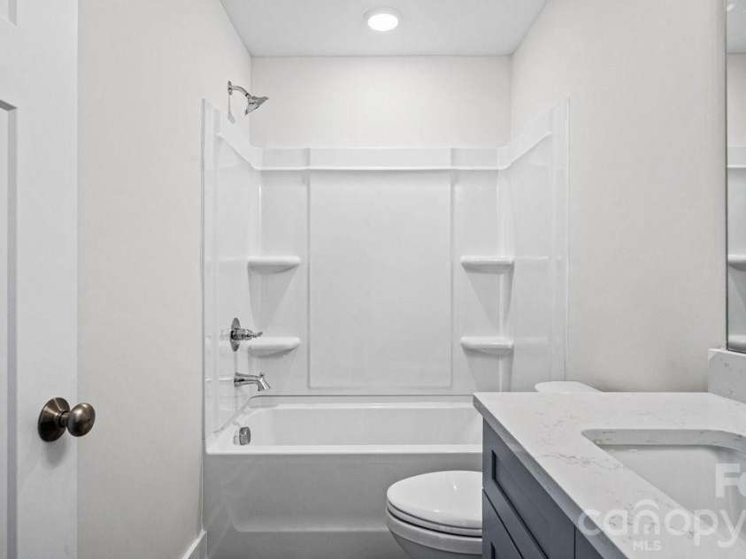 606 Teresa Circle, Waxhaw, NC 28173.  MLS# CAR4363542, YatesRealty ID 22213. Guest Bath, Quartz Tops, Tile Flooring.
