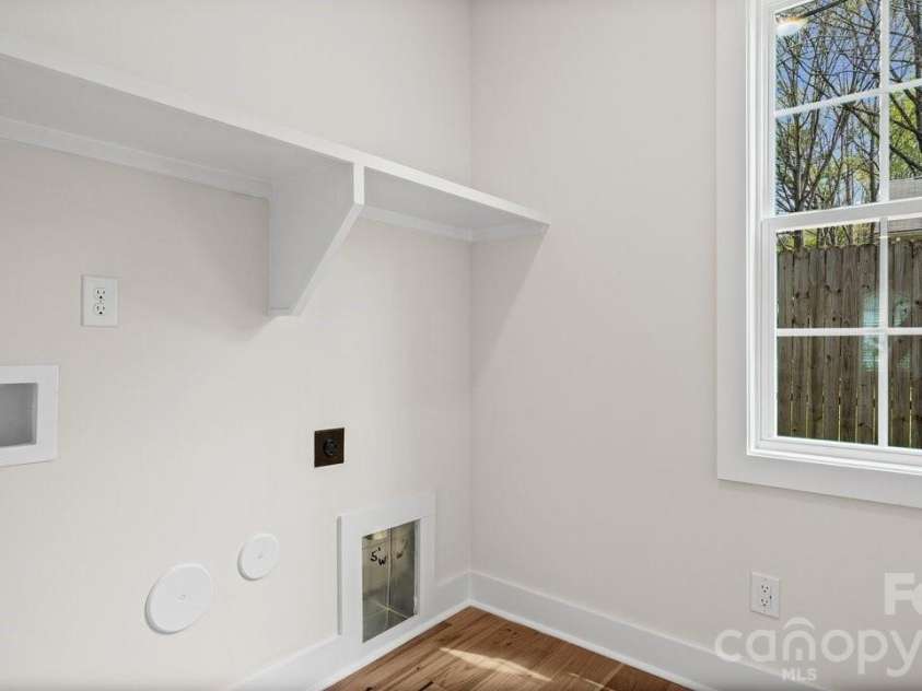 606 Teresa Circle, Waxhaw, NC 28173.  MLS# CAR4363542, YatesRealty ID 22213. Laundry with Storage Closet & Shelving