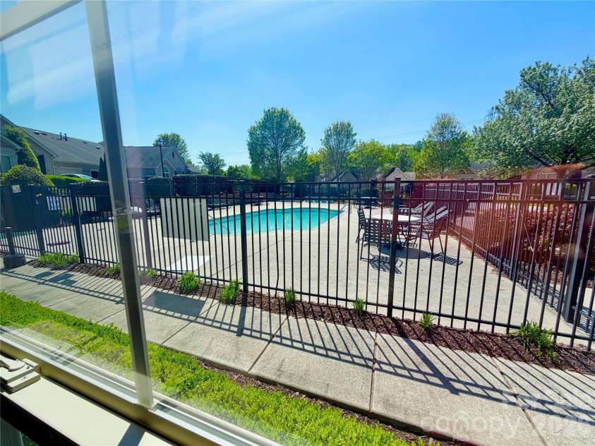 5224 Polo Gate Boulevard, Charlotte, NC 28216.  MLS# CAR4359514, YatesRealty ID 22214. Pool