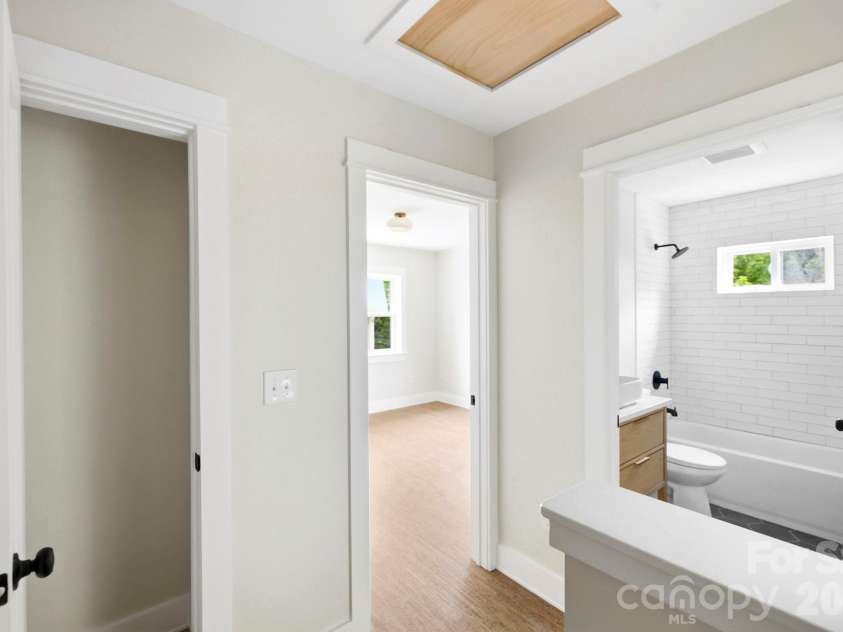17 Fireside Drive, Asheville, NC 28806.  MLS# CAR4369935, YatesRealty ID 22216. Storage closet and additional storage space in the attic
