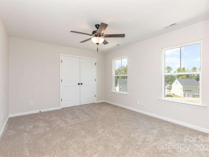 2063 Sadler Woods Lane, Charlotte, NC 28214.  MLS# CAR4275190, YatesRealty ID 22217. Primary suite on 3rd floor. Representational Photo