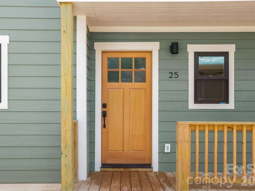 25 Fireside Drive, Asheville, NC 28806.  MLS# CAR4369919, YatesRealty ID 22217. Front door