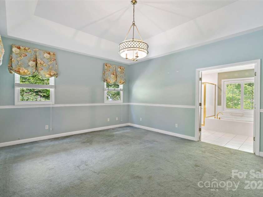 57 Rocky Branch Trail, Marion, NC 28752.  MLS# CAR4268698, YatesRealty ID 22220. Primary Bedroomapproximately 14' x 17'