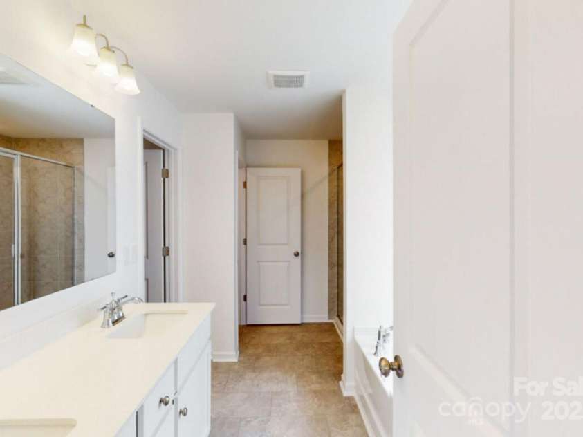 2070 Van Buren Road, Sherrills Ford, NC 28673.  MLS# CAR4155603, YatesRealty ID 22228. Owners bathroom