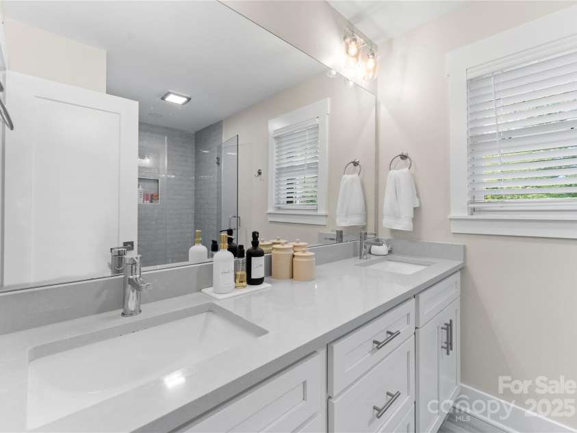3423 Sudbury Road, Charlotte, NC 28205.  MLS# CAR4246722, YatesRealty ID 22232. Primary bath with dual vanities