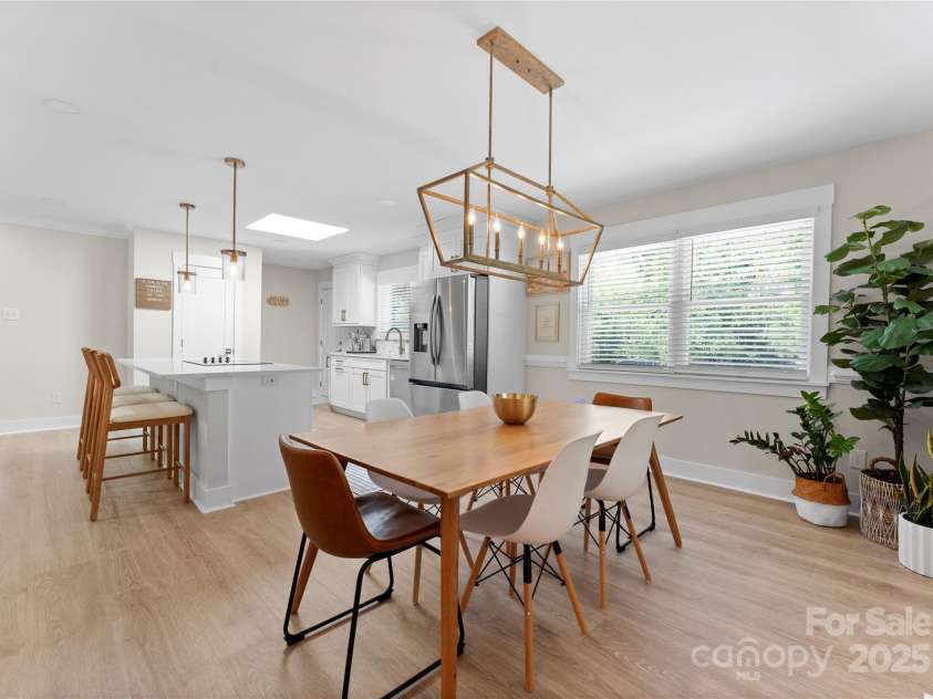 3423 Sudbury Road, Charlotte, NC 28205.  MLS# CAR4246722, YatesRealty ID 22232. The kitchen leads into the open concept dining area