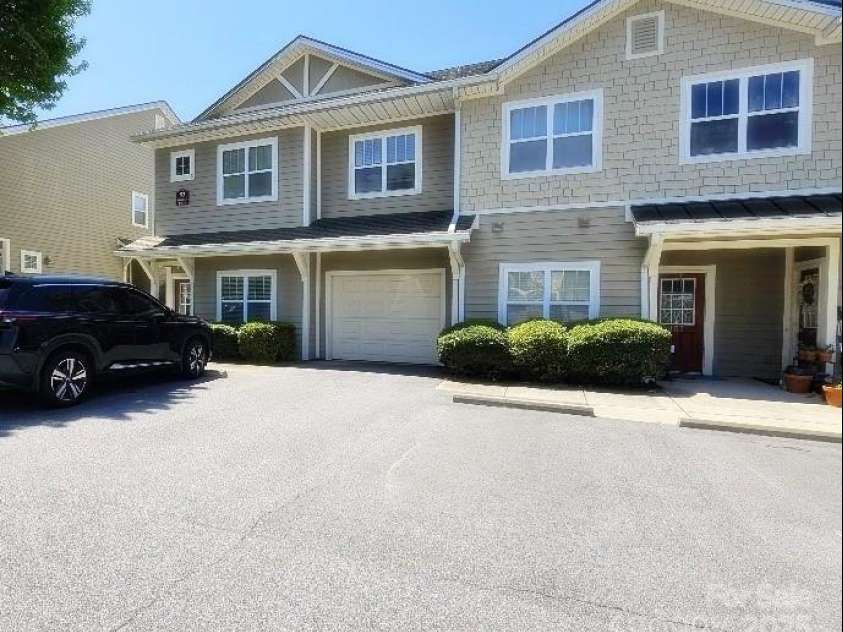 93 Foxden Drive, Fletcher, NC 28732.  MLS# CAR4251885, YatesRealty ID 22237. Front of building