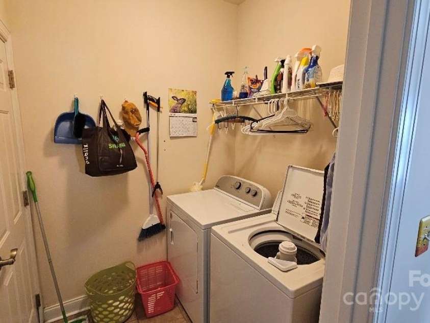 93 Foxden Drive, Fletcher, NC 28732.  MLS# CAR4251885, YatesRealty ID 22237. Garage entry from laundry/mudroom