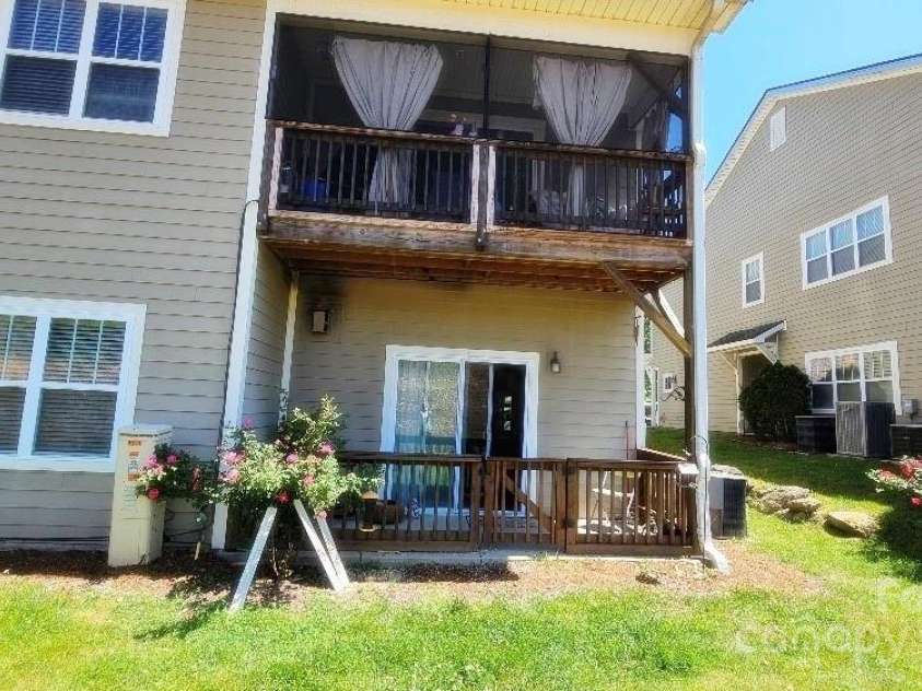 93 Foxden Drive, Fletcher, NC 28732.  MLS# CAR4251885, YatesRealty ID 22237. Looking at back patio