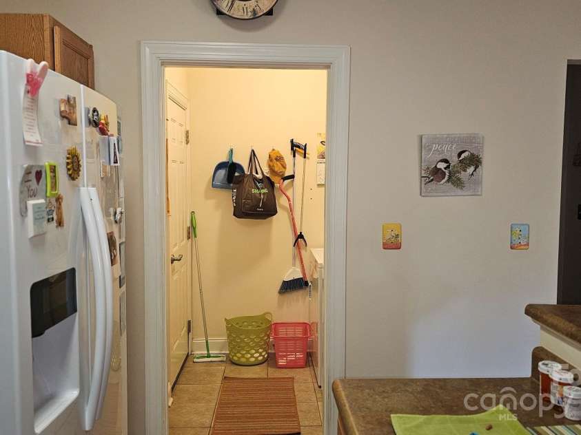 93 Foxden Drive, Fletcher, NC 28732.  MLS# CAR4251885, YatesRealty ID 22237. Looking in laundry/mud room