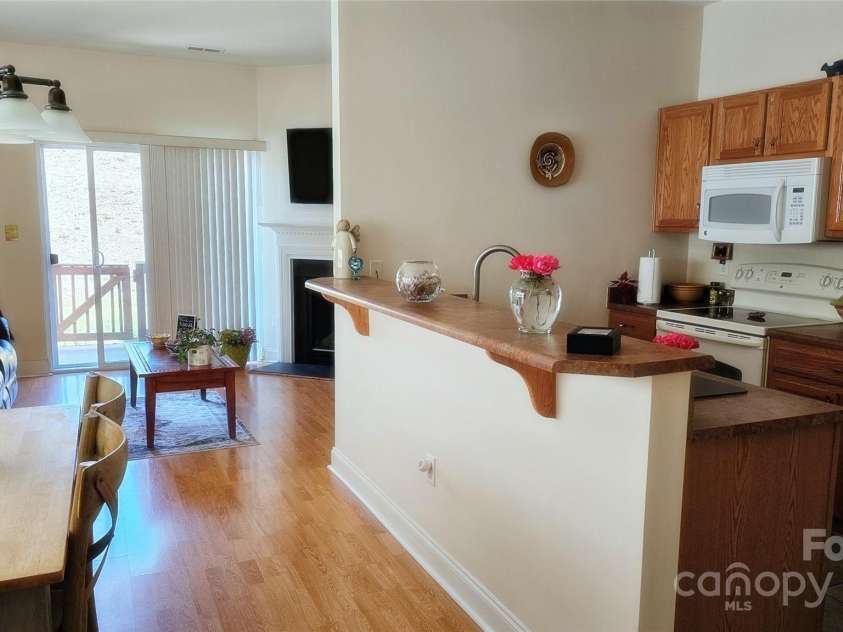 93 Foxden Drive, Fletcher, NC 28732.  MLS# CAR4251885, YatesRealty ID 22237. Looking towards kitchen from front entry