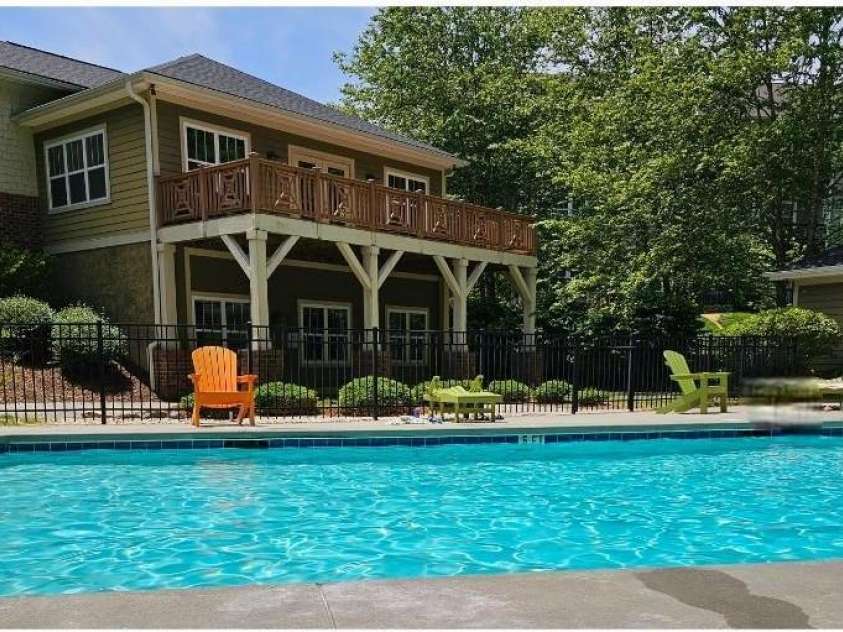 93 Foxden Drive, Fletcher, NC 28732.  MLS# CAR4251885, YatesRealty ID 22237. Pool and clubhouse