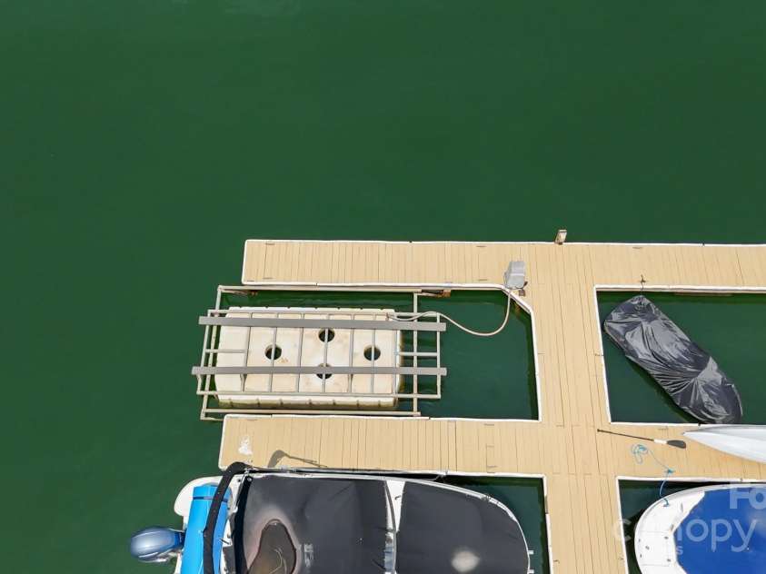 150 Pinnacle Shores Drive, Mooresville, NC 28117.  MLS# CAR4266217, YatesRealty ID 22238. Boat Slip & Lift