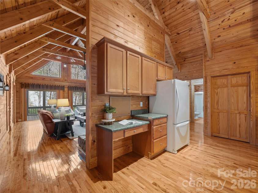 134 McDaniel Court, Lake Lure, NC 28746.  MLS# CAR4340805, YatesRealty ID 2224. Desk area and pantry in kitchen