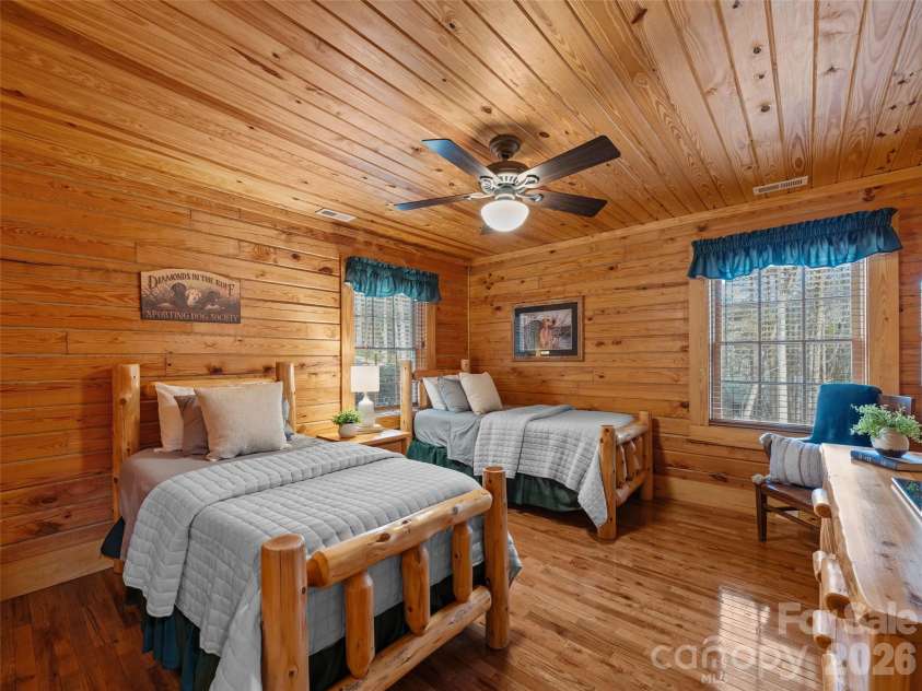 134 McDaniel Court, Lake Lure, NC 28746.  MLS# CAR4340805, YatesRealty ID 2224. Guest bedroom on main floor