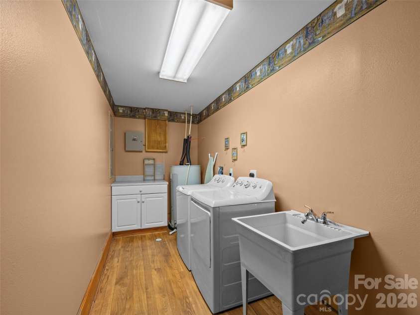 134 McDaniel Court, Lake Lure, NC 28746.  MLS# CAR4340805, YatesRealty ID 2224. Laundry room located downstairs