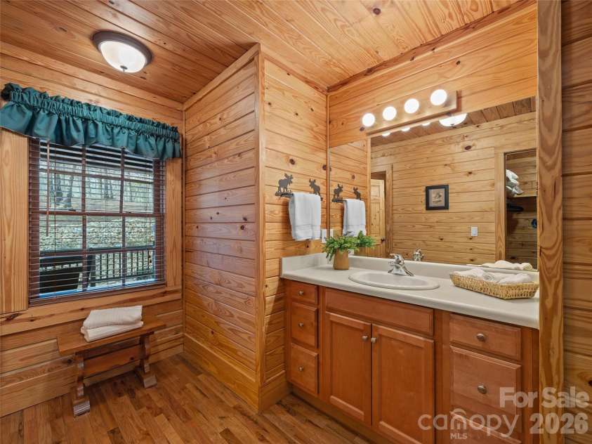 134 McDaniel Court, Lake Lure, NC 28746.  MLS# CAR4340805, YatesRealty ID 2224. Primary bath on main floor