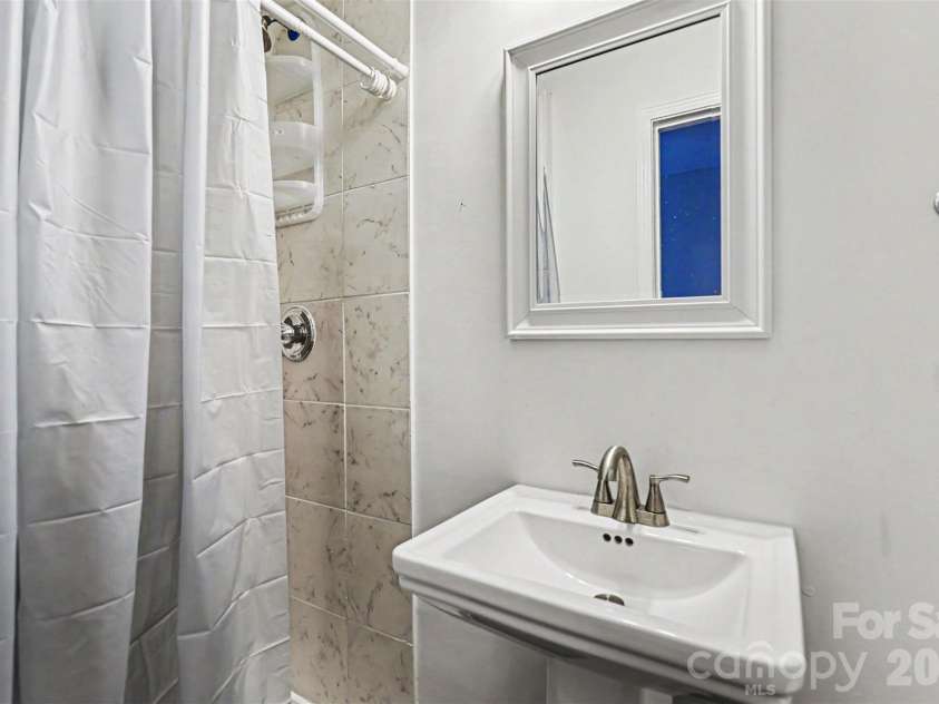 306 Cayman Way, Charlotte, NC 28217.  MLS# CAR4379005, YatesRealty ID 22241. Downstairs full bathroom
