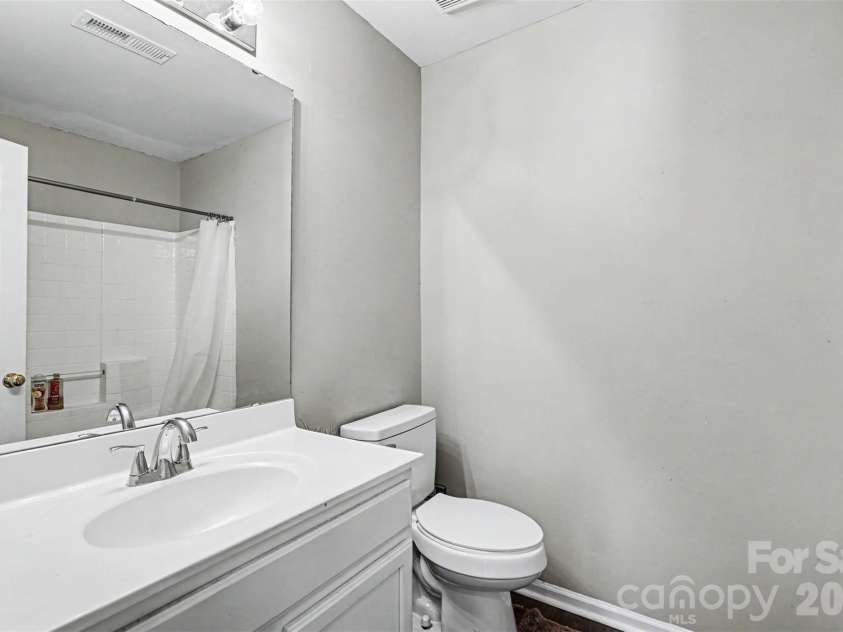 306 Cayman Way, Charlotte, NC 28217.  MLS# CAR4379005, YatesRealty ID 22241. Hall bathroom
