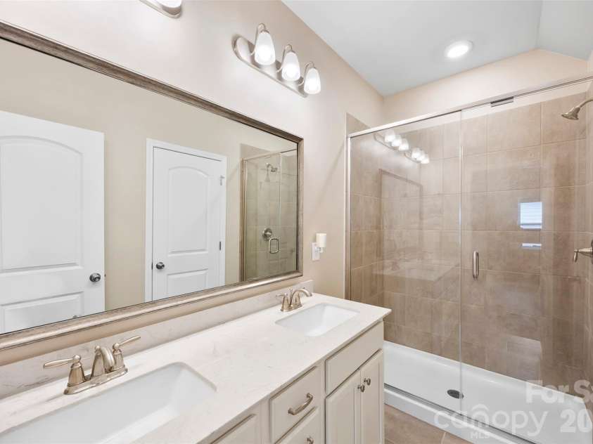423 Wescott Street, Indian Trail, NC 28079.  MLS# CAR4358336, YatesRealty ID 22249. 1st Floor Primary Bathroom