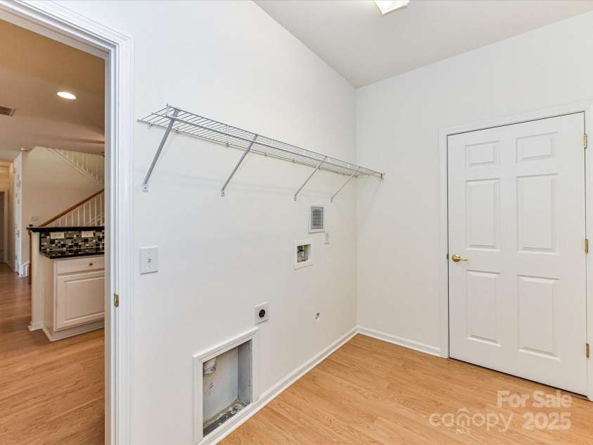 11705 Silverado Lane, Charlotte, NC 28277.  MLS# CAR4244459, YatesRealty ID 22250. Laundry Room and storage closet