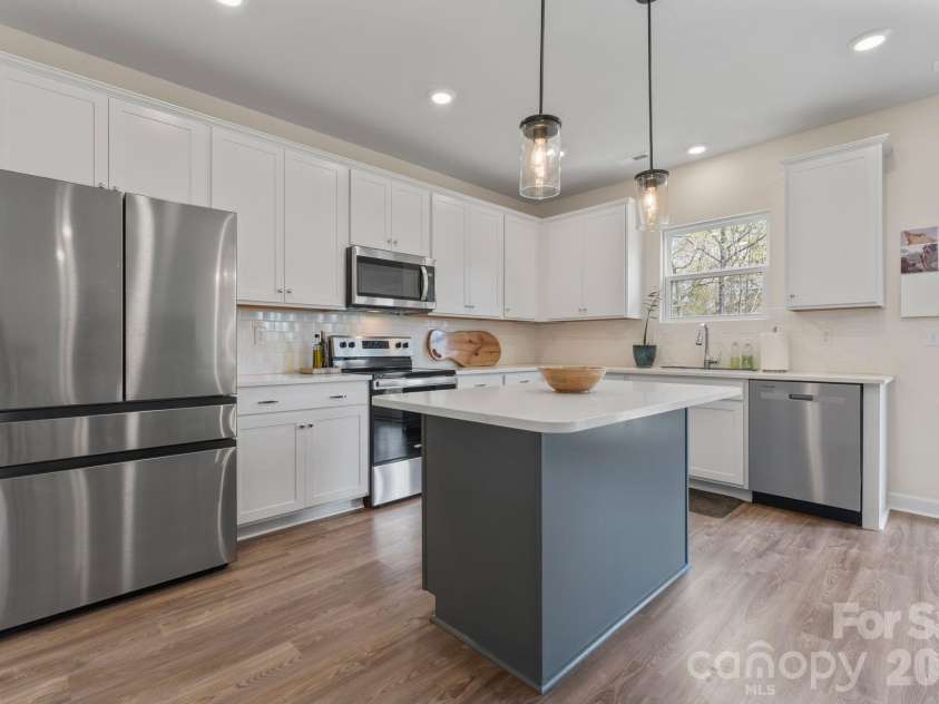 467 Hoover Road, Troutman, NC 28166.  MLS# CAR4360808, YatesRealty ID 22250. Large Open Kitchen!