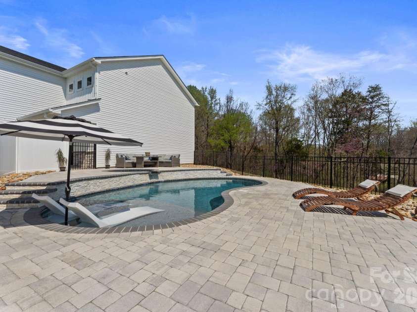 467 Hoover Road, Troutman, NC 28166.  MLS# CAR4360808, YatesRealty ID 22250. Pool sun deck, spa