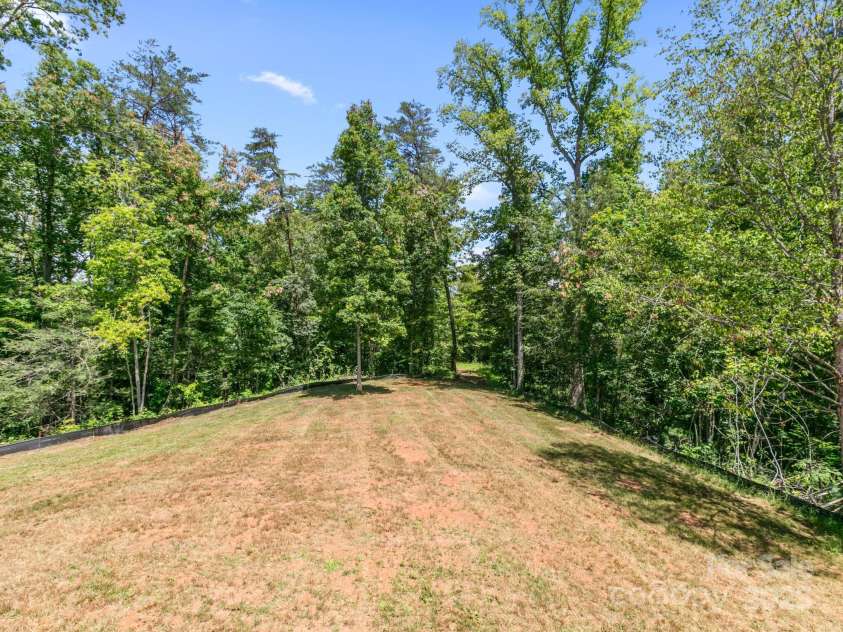 208 Walnut Branch Road, Weaverville, NC 28787.  MLS# CAR4272561, YatesRealty ID 22254. Large usable backyard