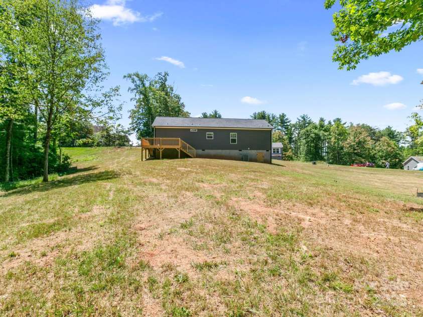 208 Walnut Branch Road, Weaverville, NC 28787.  MLS# CAR4272561, YatesRealty ID 22254. Large usable backyard
