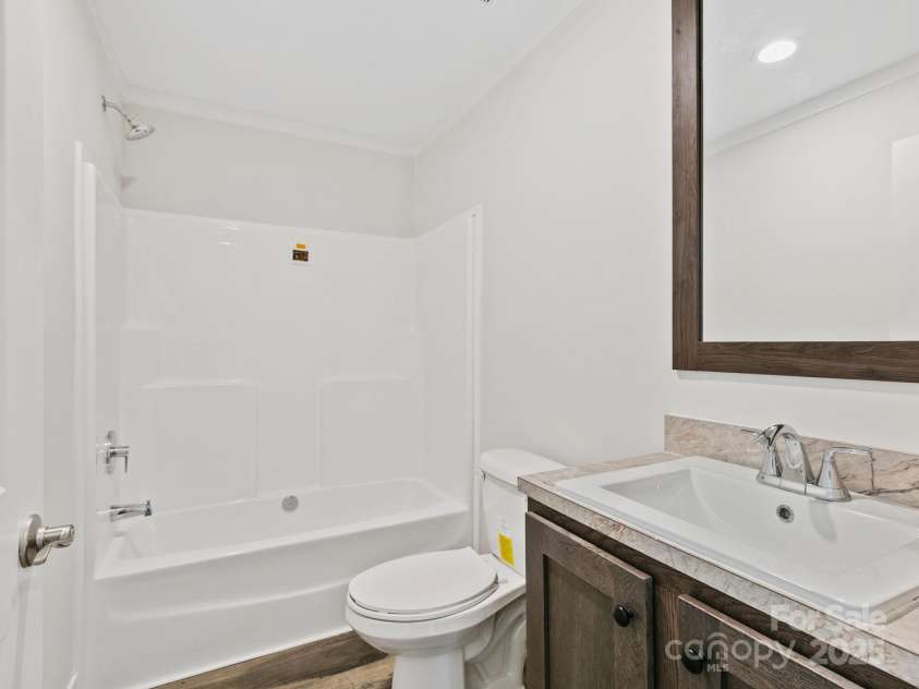 206 Walnut Branch Road, Weaverville, NC 28787.  MLS# CAR4271269, YatesRealty ID 22255. Hall Bathroom