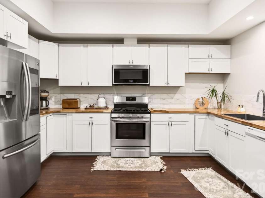 50 Carden Drive, Weaverville, NC 28787.  MLS# CAR4368414, YatesRealty ID 22258. Lower level kitchen