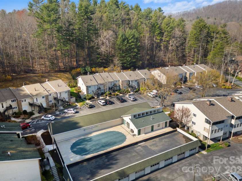 630 Britton Creek Drive, Hendersonville, NC 28791.  MLS# CAR4241236, YatesRealty ID 22259. Drone of Britton Creek