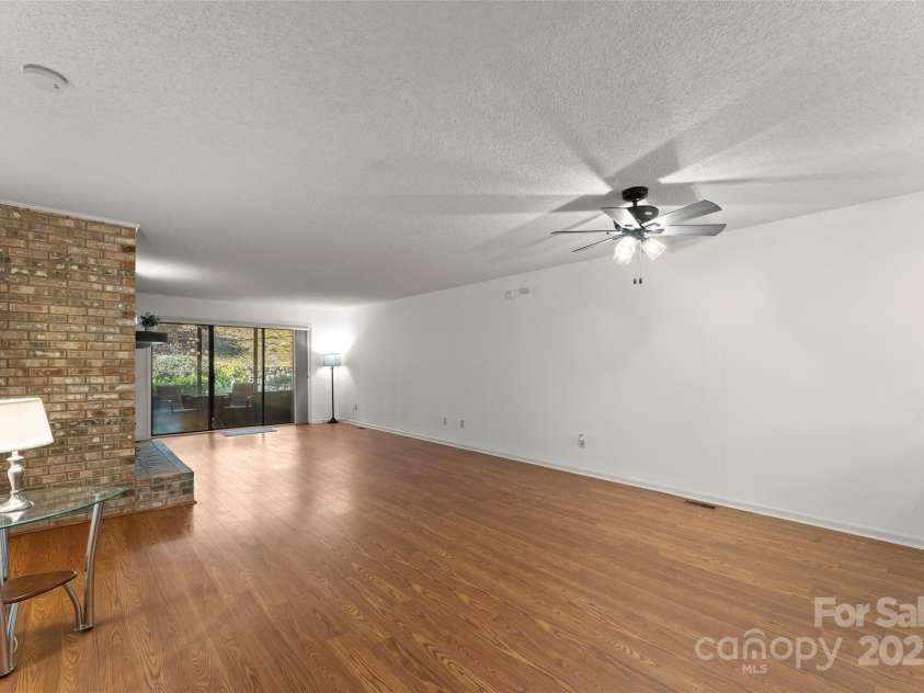 630 Britton Creek Drive, Hendersonville, NC 28791.  MLS# CAR4241236, YatesRealty ID 22259. Great Room with Fireplace