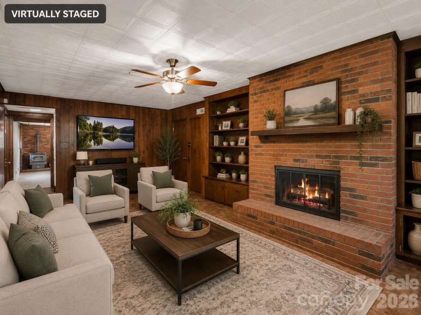 92 Greenwood Acres Drive, Mills River, NC 28759.  MLS# CAR4379255, YatesRealty ID 22276. Basement den virtually staged