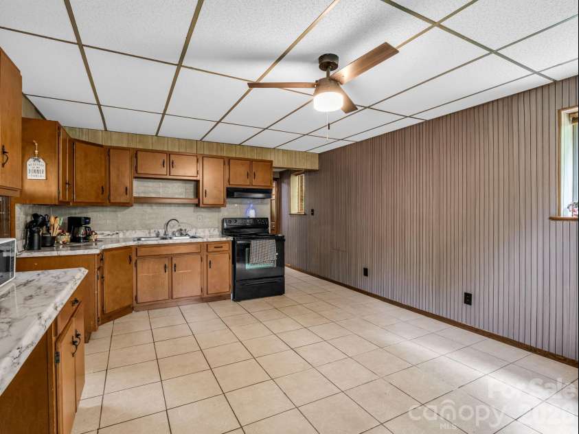 92 Greenwood Acres Drive, Mills River, NC 28759.  MLS# CAR4379255, YatesRealty ID 22276. Basement kitchen
