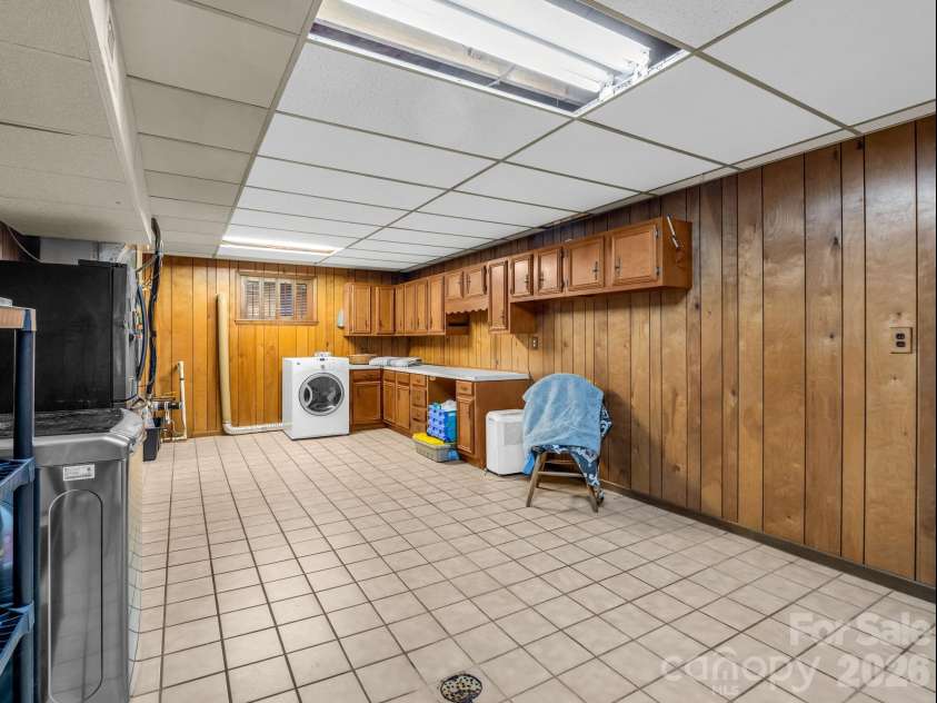 92 Greenwood Acres Drive, Mills River, NC 28759.  MLS# CAR4379255, YatesRealty ID 22276. Basement kitchen
