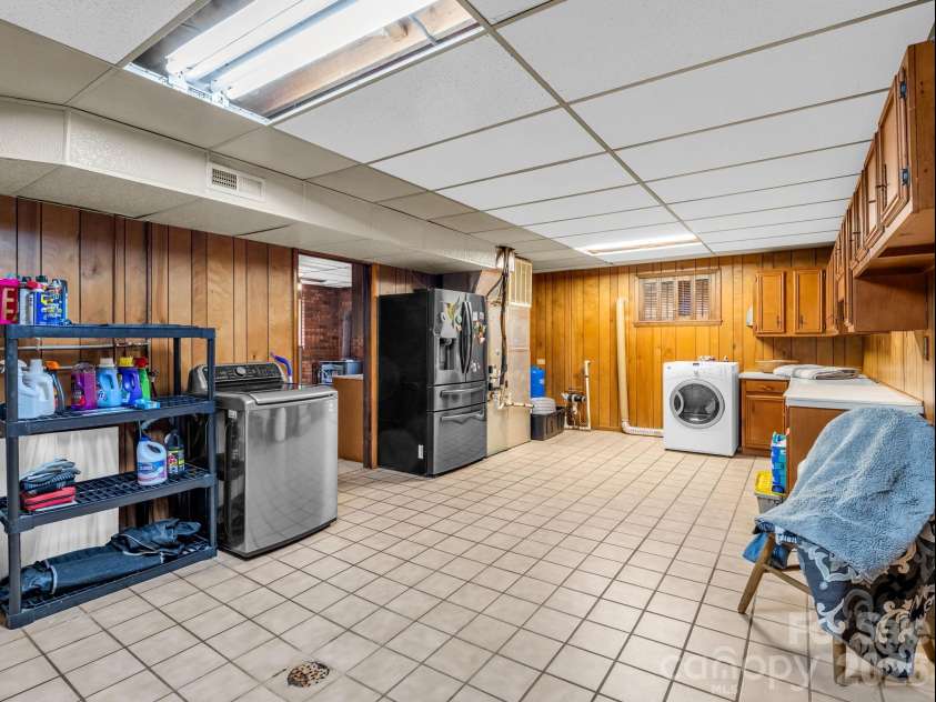 92 Greenwood Acres Drive, Mills River, NC 28759.  MLS# CAR4379255, YatesRealty ID 22276. Basement kitchen