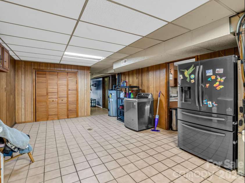 92 Greenwood Acres Drive, Mills River, NC 28759.  MLS# CAR4379255, YatesRealty ID 22276. Basement kitchen