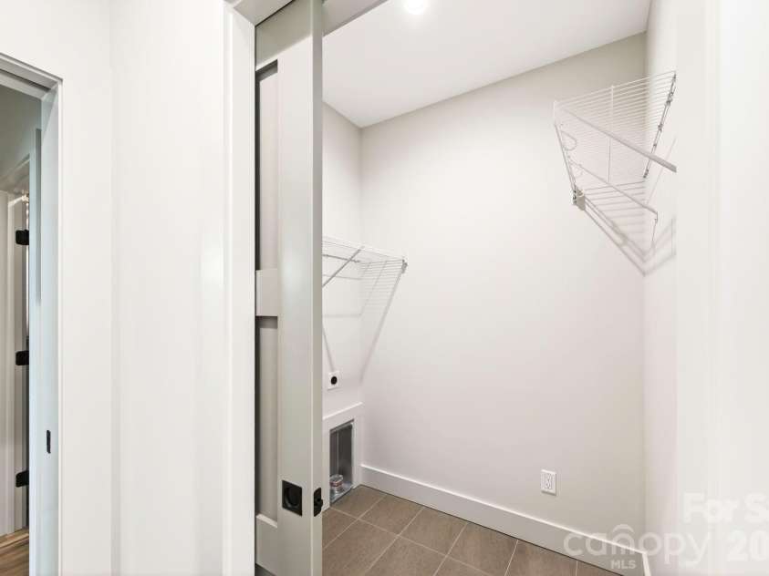 63 Orrinel Way, Asheville, NC 28806.  MLS# CAR4375047, YatesRealty ID 22277. Laundry Room On Main Level