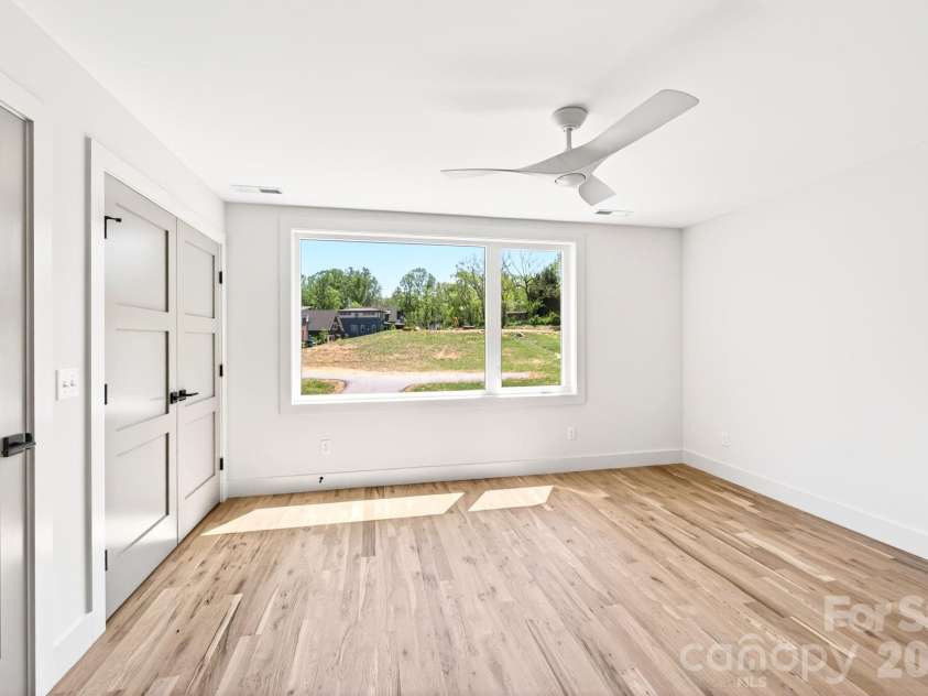 63 Orrinel Way, Asheville, NC 28806.  MLS# CAR4375047, YatesRealty ID 22277. Second Level Bedroom with Two Closets
