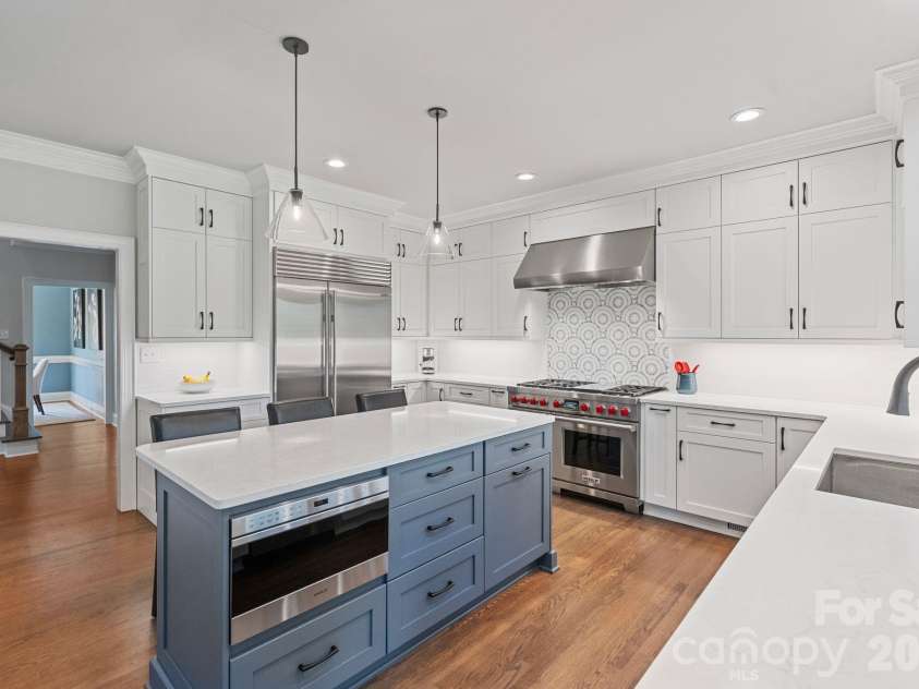 18003 Lochcarron Lane, Cornelius, NC 28031.  MLS# CAR4377616, YatesRealty ID 22279. Kitchen with Sub Zero refrigerator