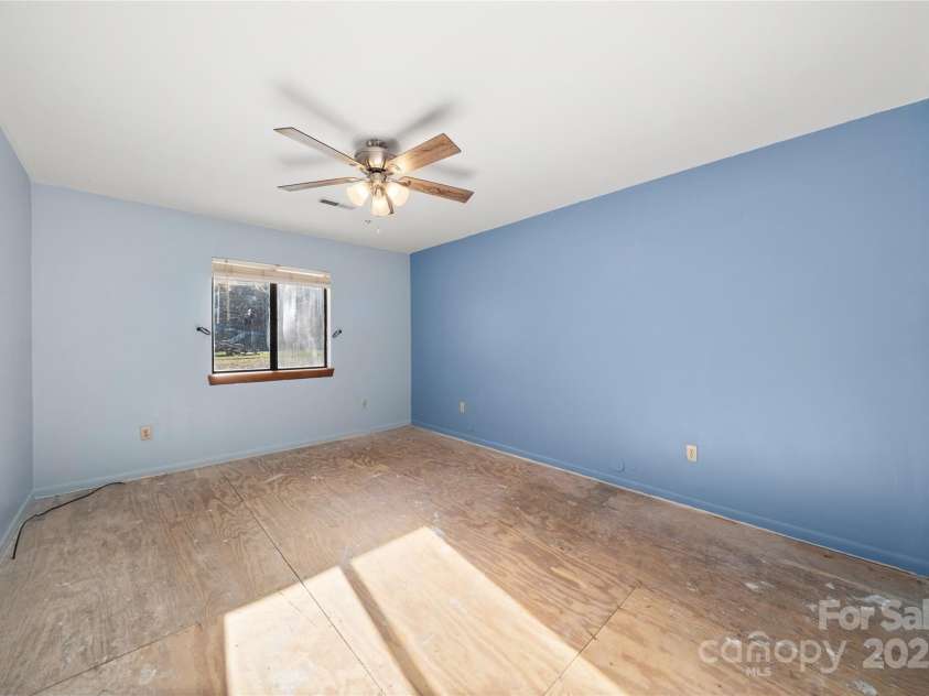 94 Market Street, Maggie Valley, NC 28751.  MLS# CAR4277066, YatesRealty ID 2228. Larger bedroom